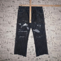 38 - Vintage Y2K South Pole 2000s baggy faded thrashed pants