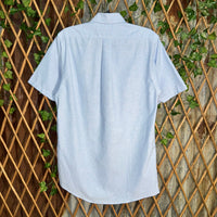 Vintage Y2K 76 gasoline checkered flag racing 1990s polo tee