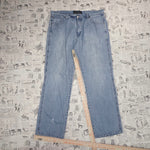 38 - Vintage Y2K TNM super faded denim 00s baggy jeans pants