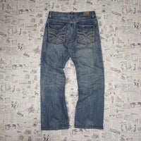 33 - Vintage Y2K flypaper jeans essential baggy denim pants